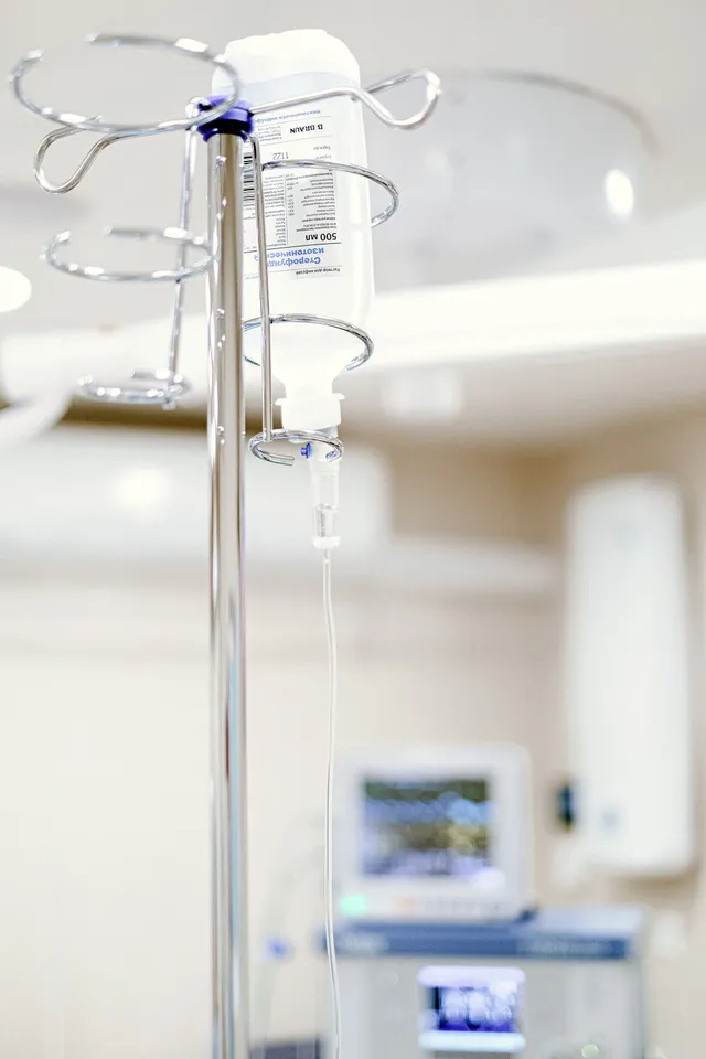 IV therapy session with drip bag and comfortable chair